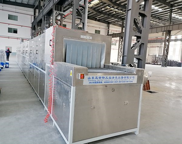 通過(guò)式清洗機(jī)的工作原理是什么？